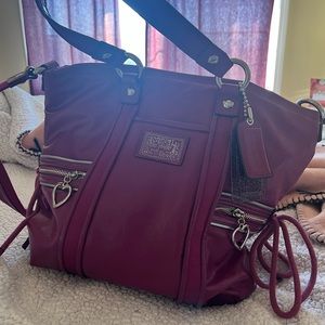 Glossy magenta, more purple than pink Poppy Bag. Perfect midsized bag.